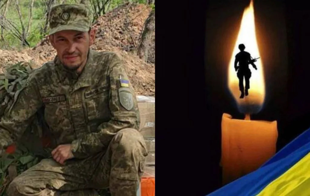 Український військовий і свічка пам’яті героїв