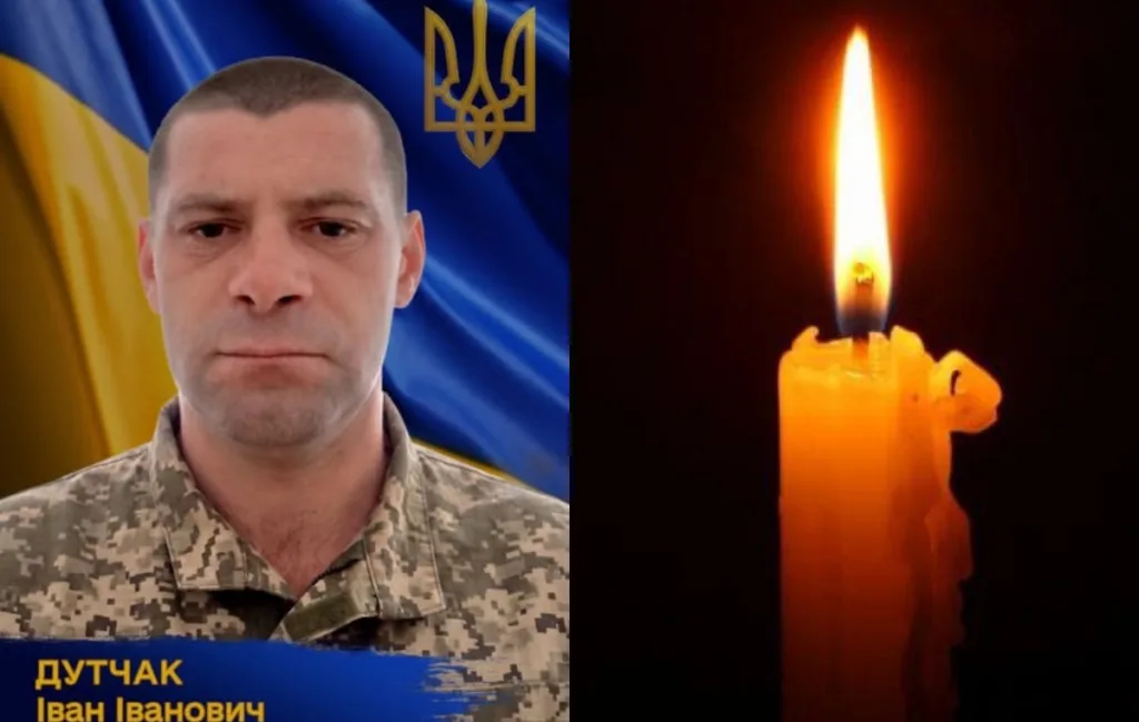 Український військовий та палаюча свічка пам’яті