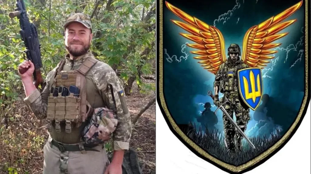 Український військовий та герб із золотими крилами
