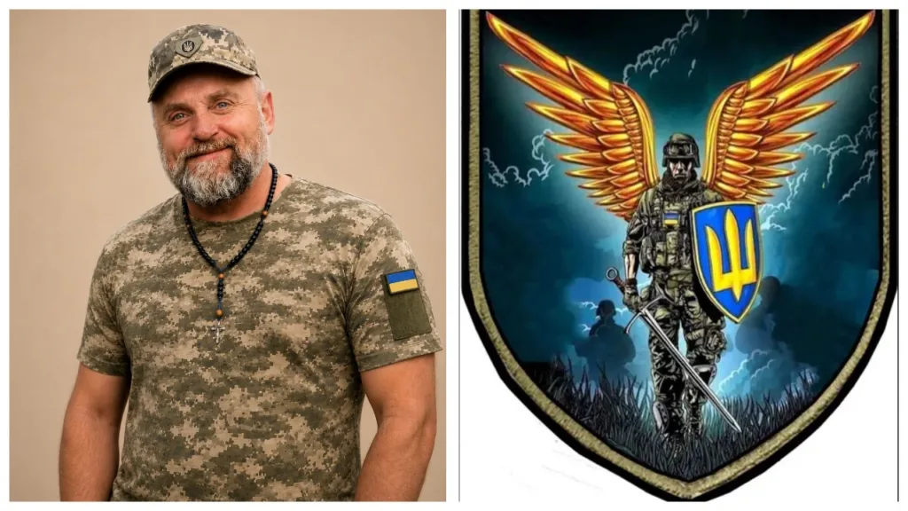 Український військовий та герб із золотими крилами