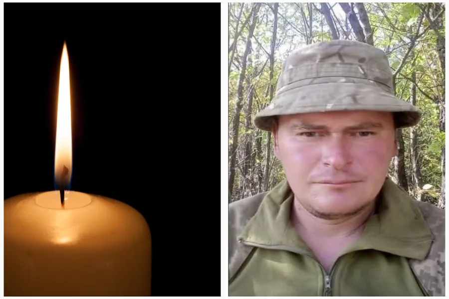 Запалена свічка та військовий у лісі