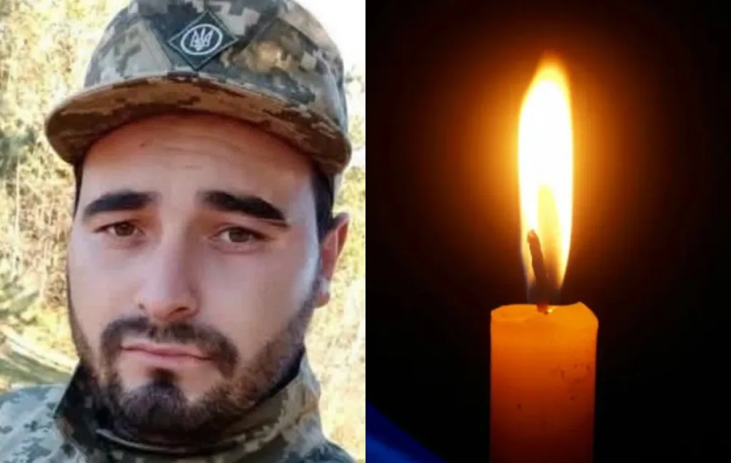 Військовий у формі та палаюча свічка пам’яті