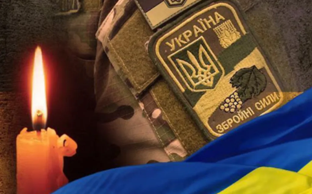 Свічка, шеврон ЗСУ та прапор України