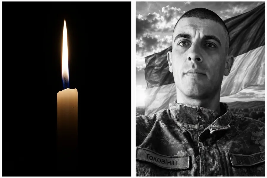Свічка пам’яті та український військовий з прапором
