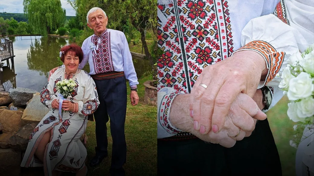 Пара літніх людей у вишиванках біля озера