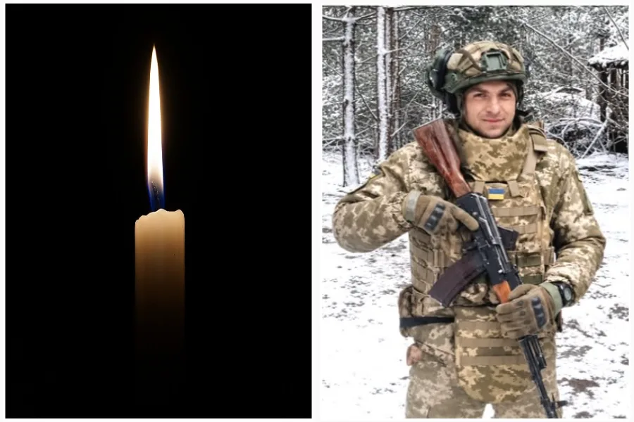 Запалена свічка та український військовий взимку