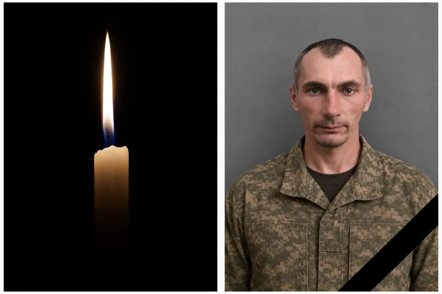 Запалена свічка та військовий у камуфляжі в жалобі