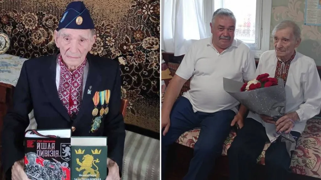 Ветеран у вишиванці з медалями та квітами