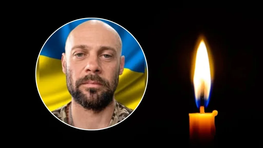 Портрет військового та палаюча свічка пам’яті