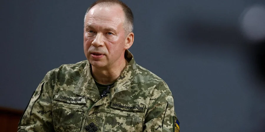 Український військовий у камуфляжній формі під час інтерв'ю