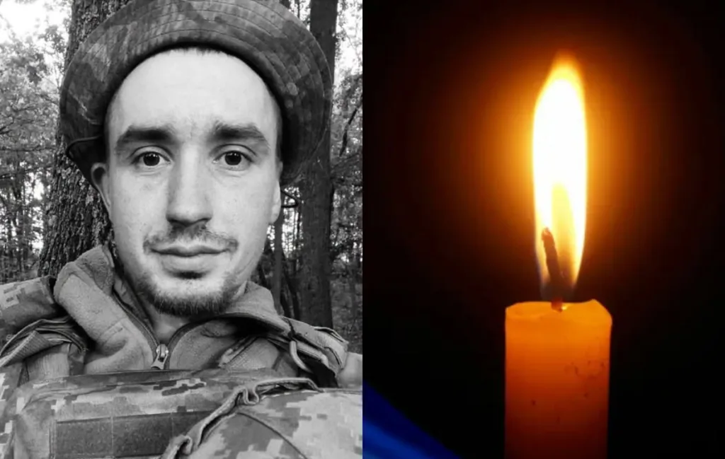 Військовий у формі та запалена свічка пам’яті