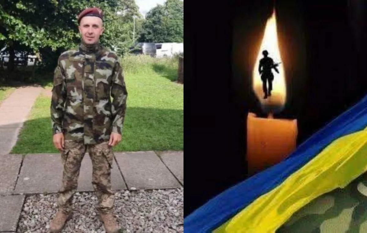 Український військовий та свічка пам’яті з прапором