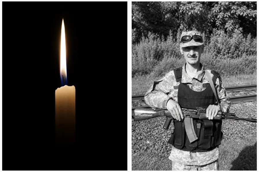 Свічка пам’яті та військовий із автоматом