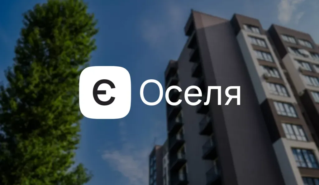 Логотип Оселя на тлі сучасного житлового будинку