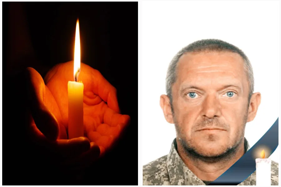 Свічка пам’яті поруч із портретом військовослужбовця
