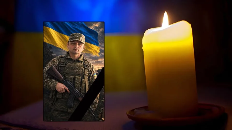 Свічка пам’яті та портрет українського військового
