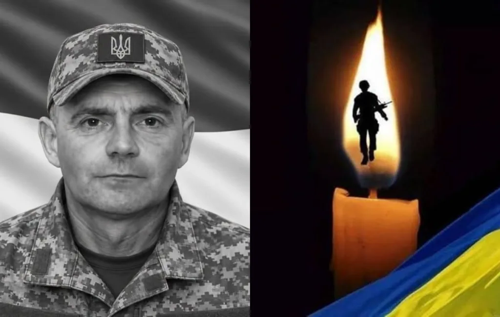 Портрет українського військового поруч із меморіальною свічкою
