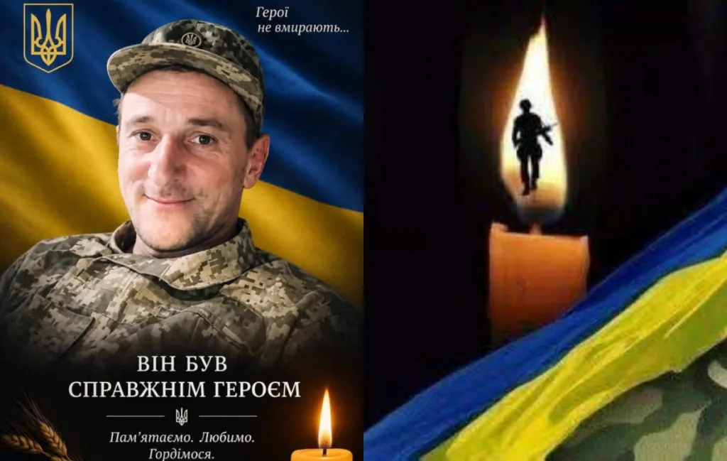 Меморіал українському військовому на тлі прапора і свічок