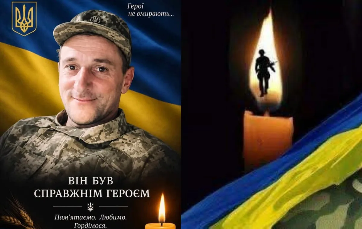 Меморіал українському військовому на тлі прапора і свічок
