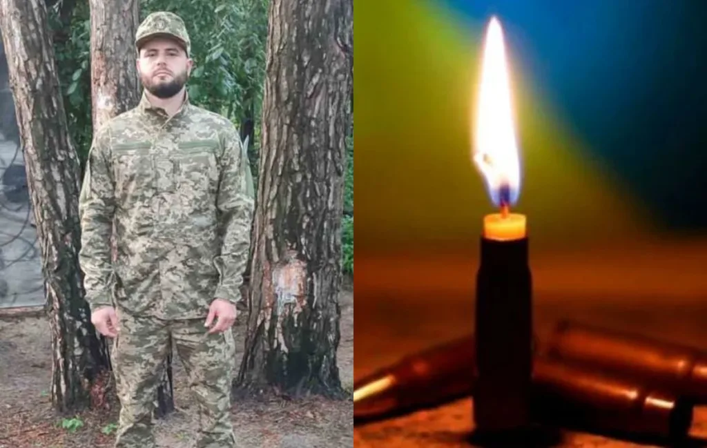Військовий у камуфляжі поруч із запаленою свічкою