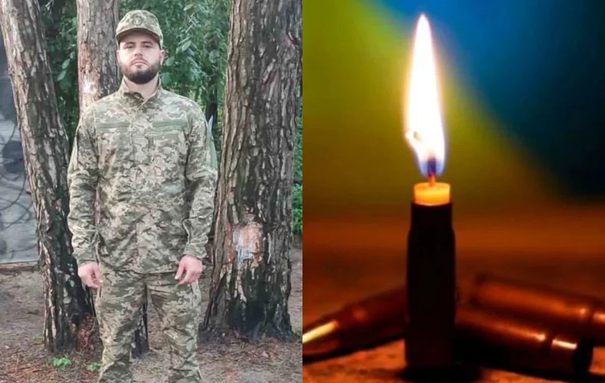 Військовий у камуфляжі поруч із запаленою свічкою